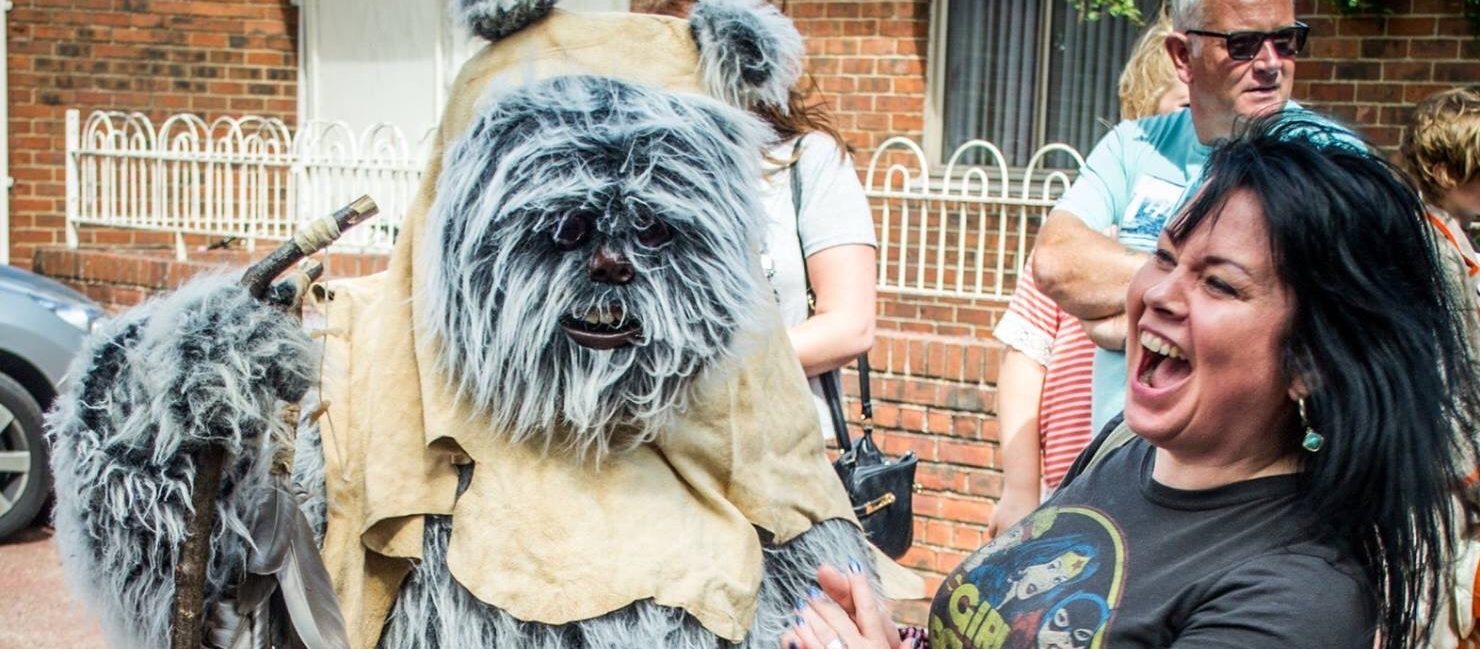 Ewok at Comic Con Ewock and lady laughing
